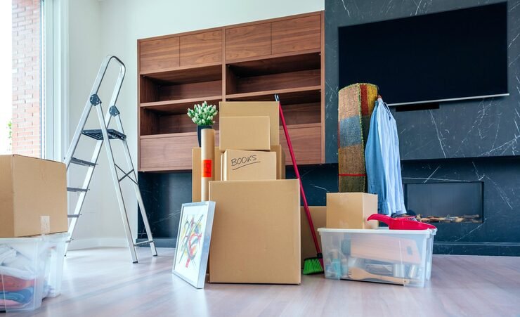 large living room with stack moving boxes_156252 3638