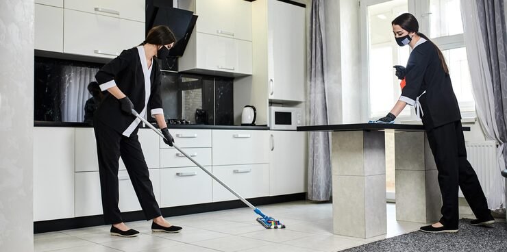 professional cleaning service company employee rubber gloves with mop removes dirt from floor kitchen surfaces disinfects sterilizes_194143 7512